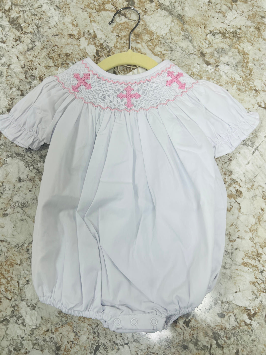 Pink smocked crosses on White Bubble